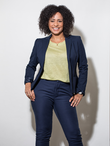 woman in suit smiling